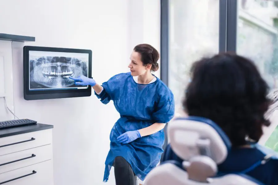 Young Woman Having Online Meeting With Female Healthcare Person