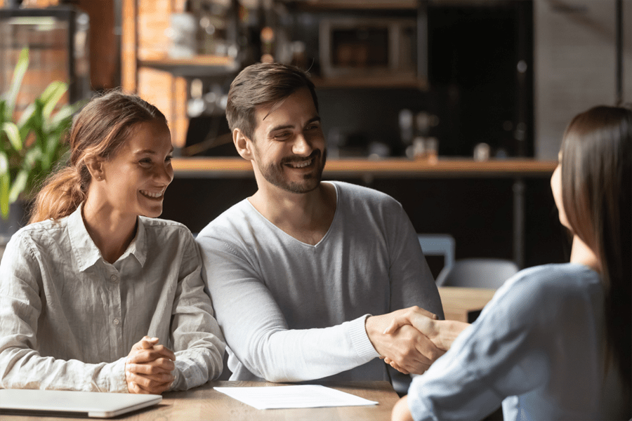 YoungCoupleMeetingWithInsuranceAgent