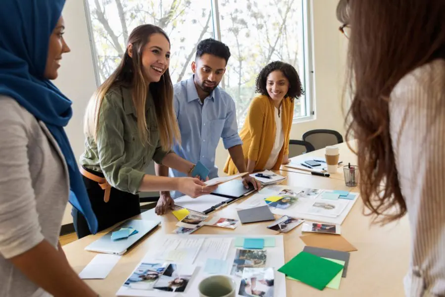 Creative team working on project around a table
