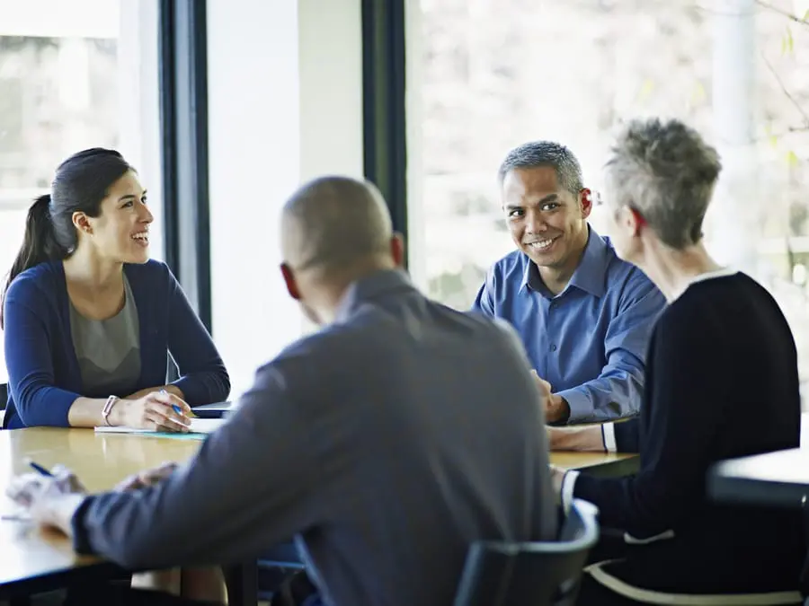 Coworkers In Planning At Conference Table