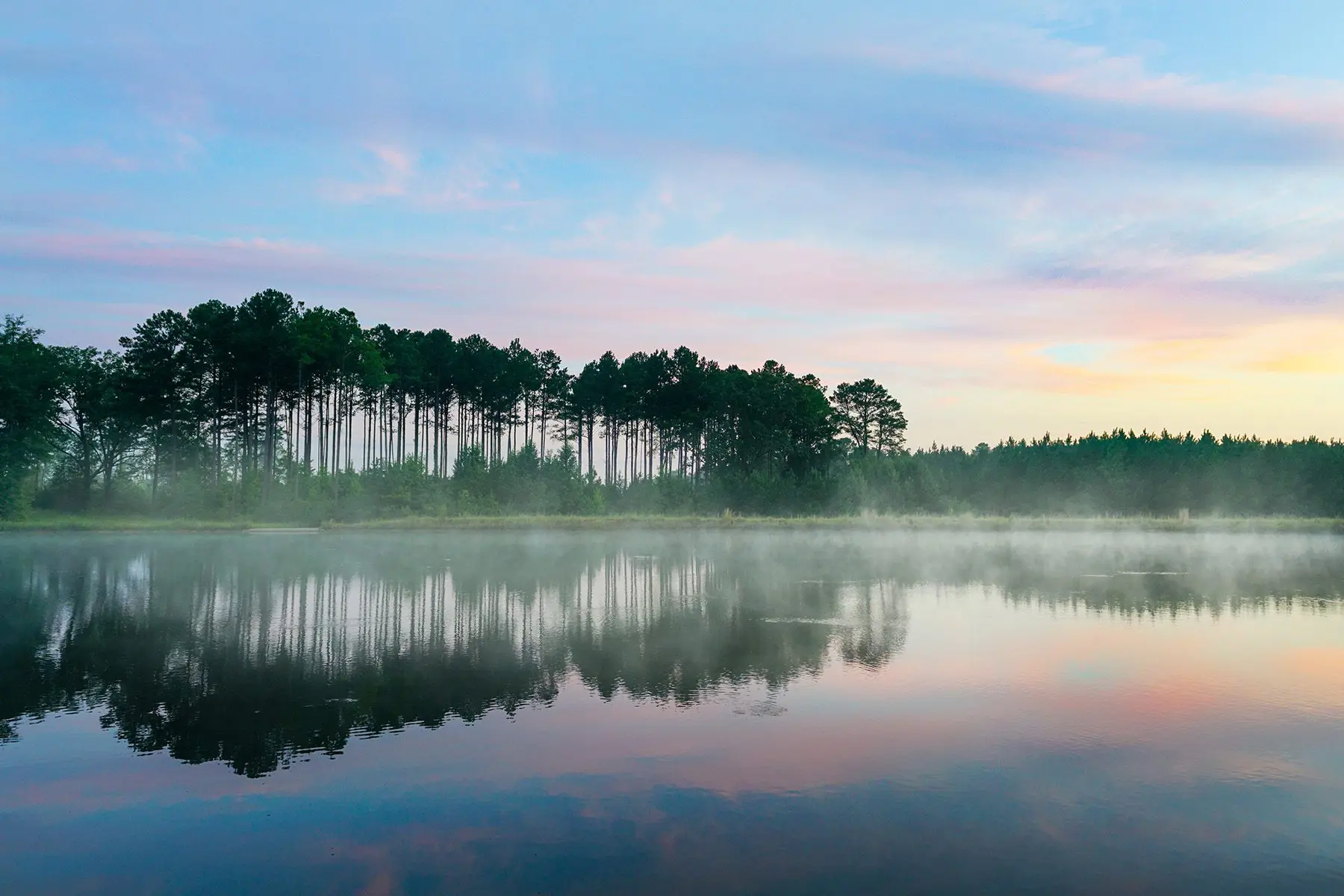 Calm water on a lake in the morning