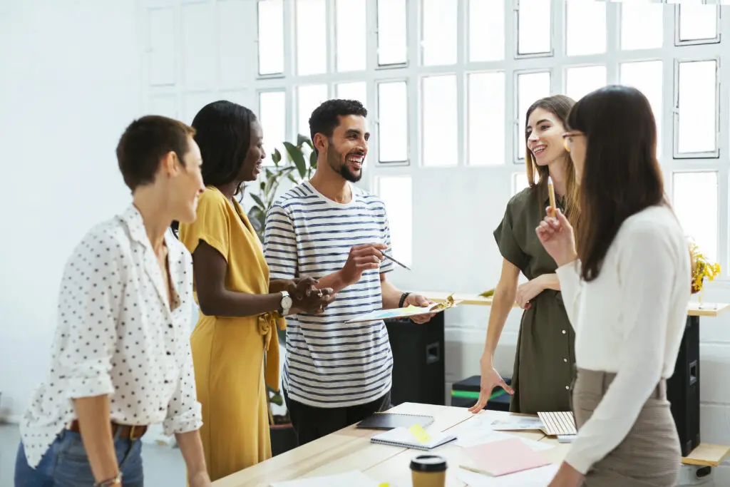 Group of young professionals having a discussion during an employee meeting