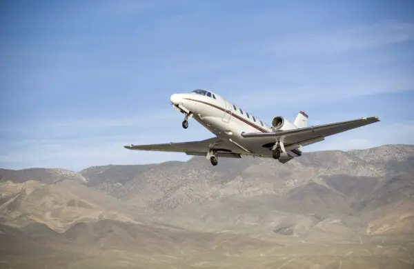 Cessna Citation charter private jet launching from airport