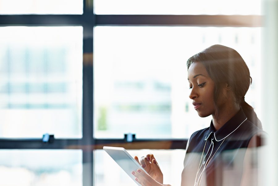 Business Woman Taking Notes On Device (2)