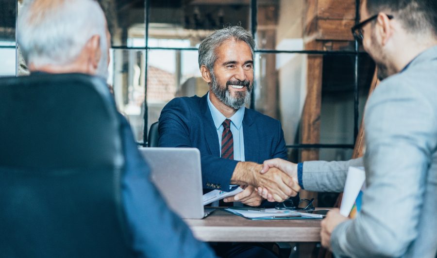 HR-consultant-shaking-hands-with-client