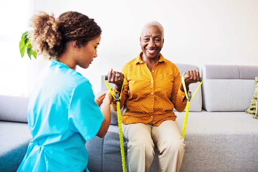 Home Visit Nurse And Her Patient