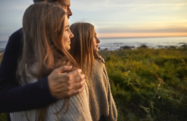 A family looking at a sunset