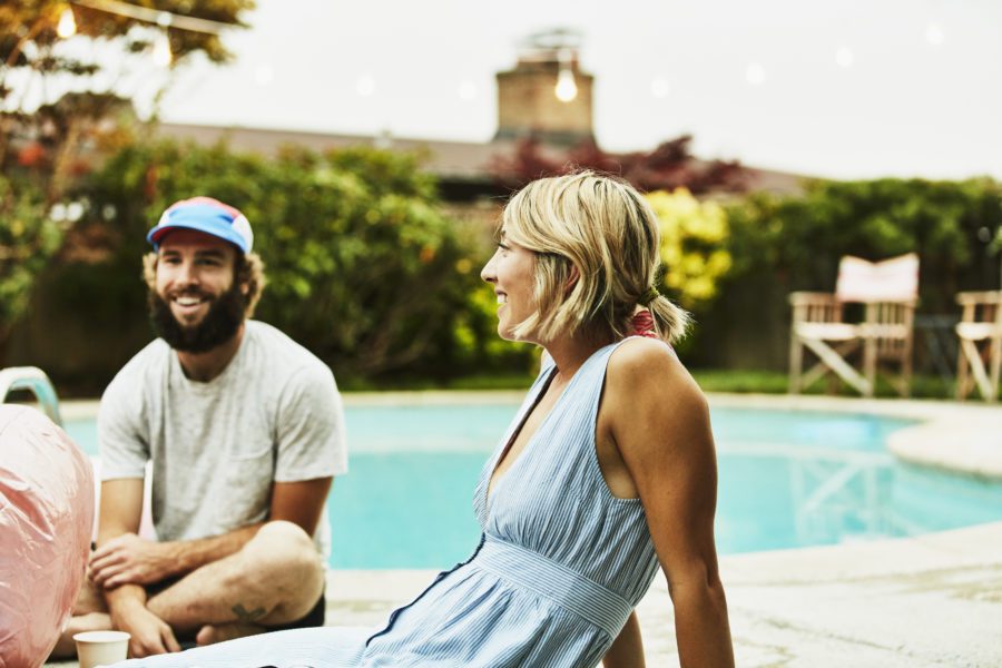 Couple Lounging at Pool