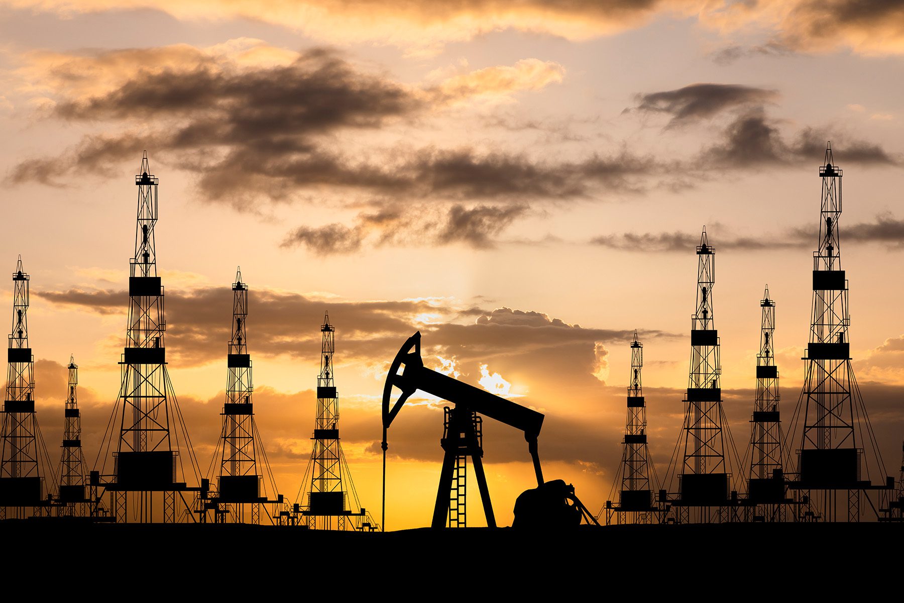 Oil rig at sunset