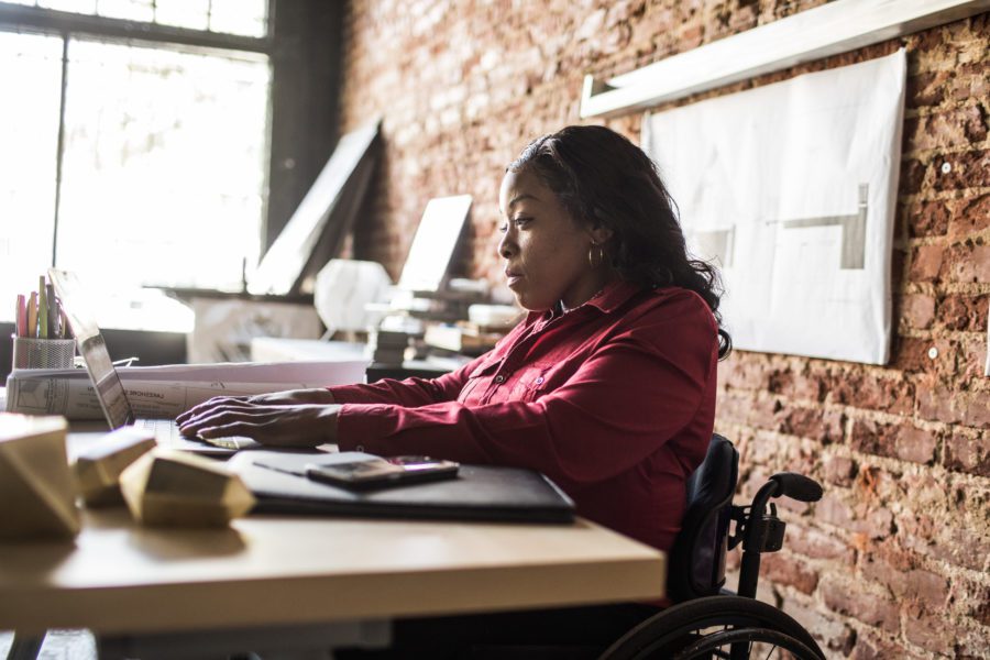 woman-in-wheelchair-researching-disability-insurance