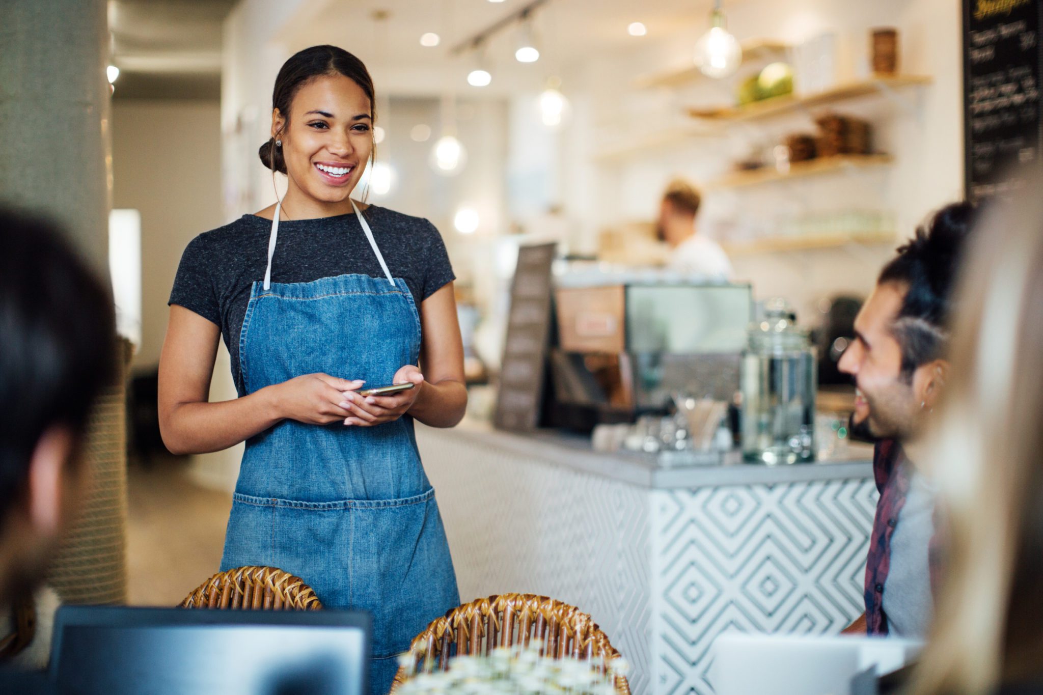 waitress-happy-her-work-has-restaurant-insurance