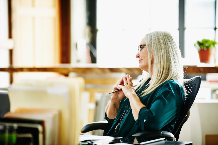 business-woman-thinking-about-charity-owned-life-insurance