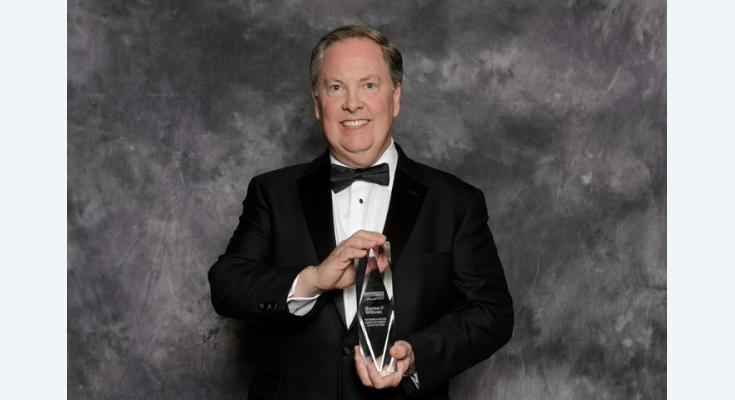 Rusty Reid receiving award