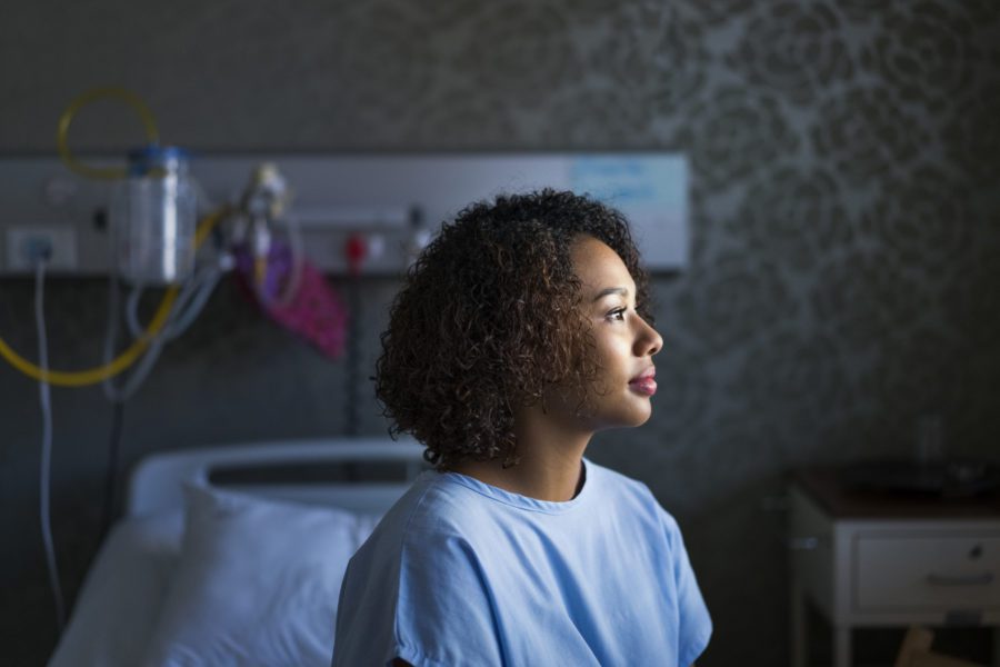 woman-with-long-term-care-insurance-looking-out-window