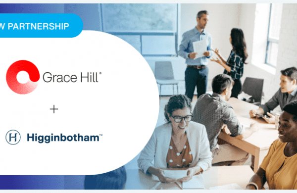 Announcement of Grace Hill and Higginbotham partnership. People sit and tables and discuss.