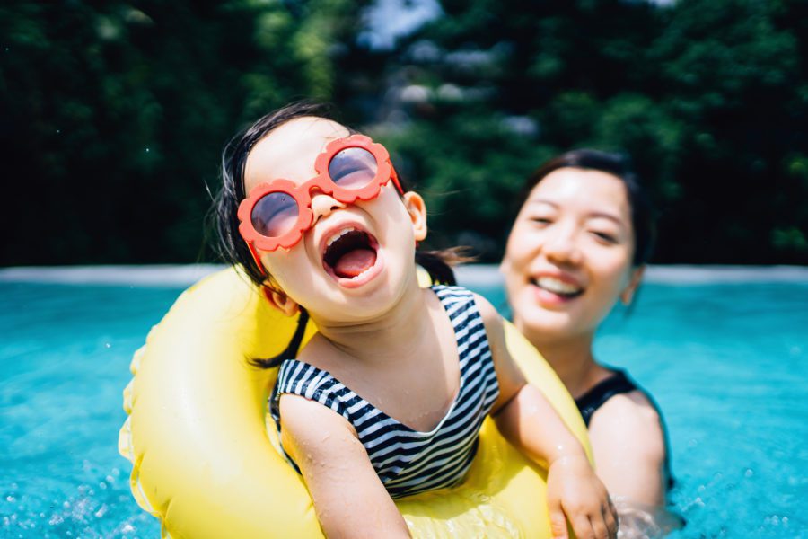 family-playing-in-pool