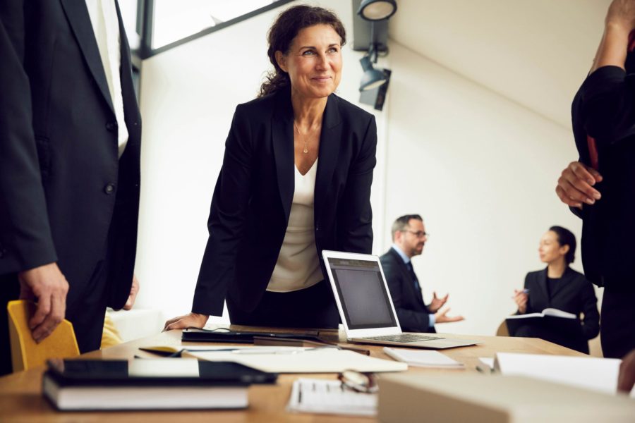 Business woman meeting with clients