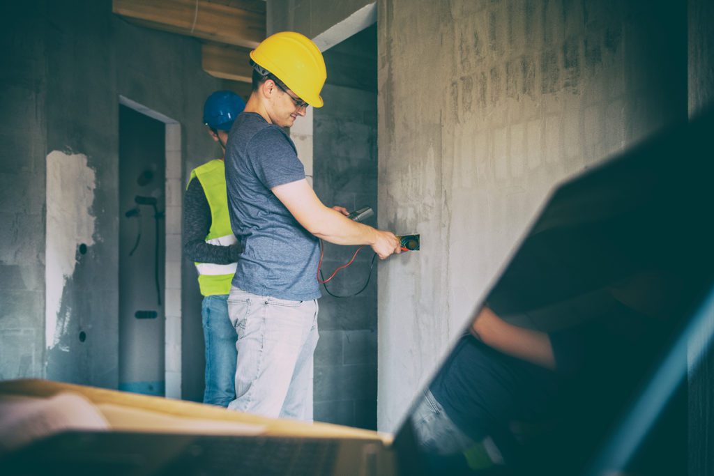 Electrician working in home