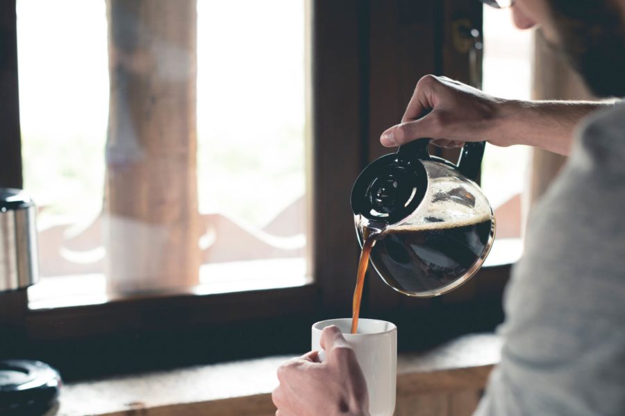 Man taking coffee break at work