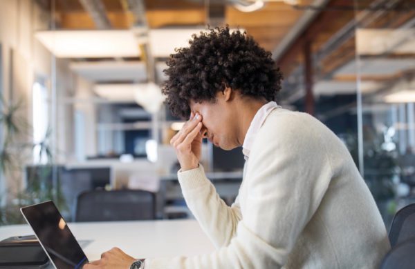 Man stressed out at work