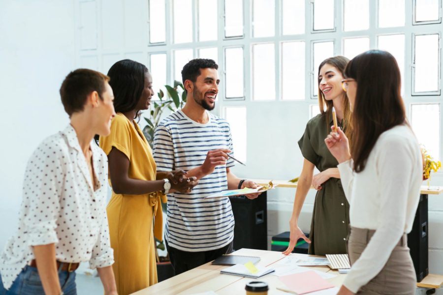 Group of young employees working together