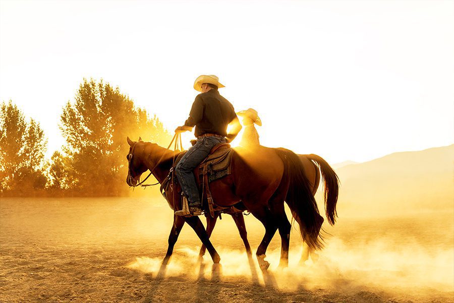 Two Ranchers On Their Horses