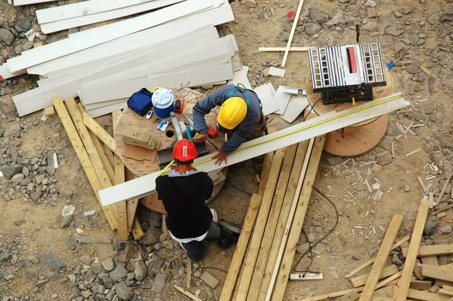 Two lawyers are discussing about contract paper, law matters determination, pointing.law and hammer on the table