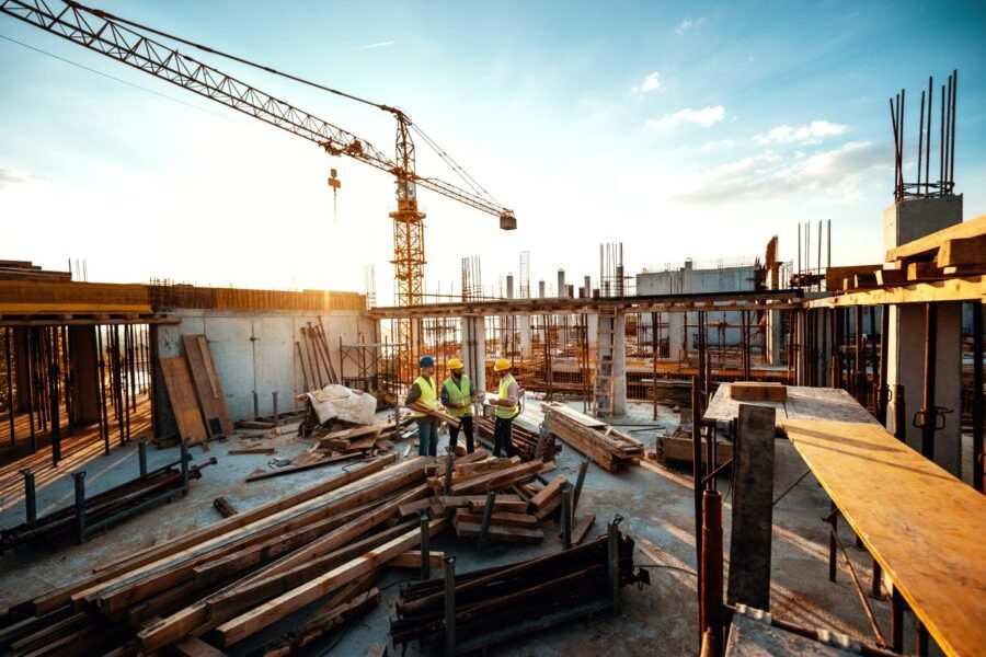 Experienced Engineer Explaining The Problems In Construction Works Development After Recession