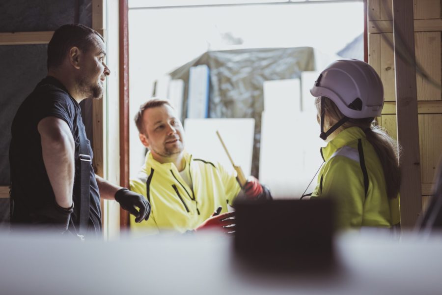 Construction workers talking