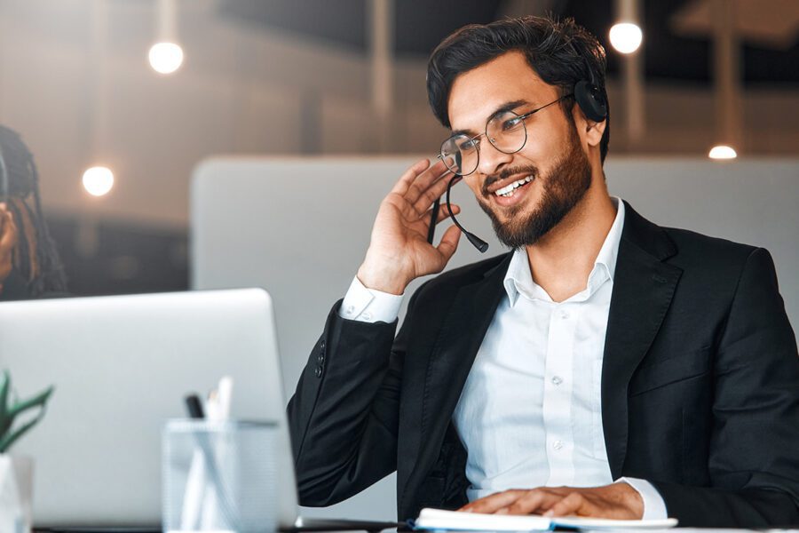 InsuranceAgentWithHeadsetOnPhone