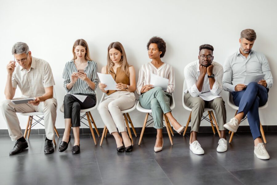 Diverse business people waiting for job interview