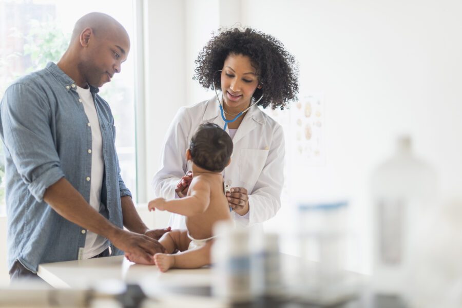 Father and baby at doctor's office