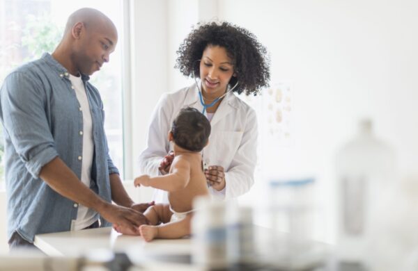 Father and baby at doctor's office