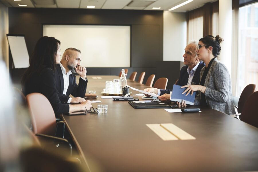 lawyers discussing with clients