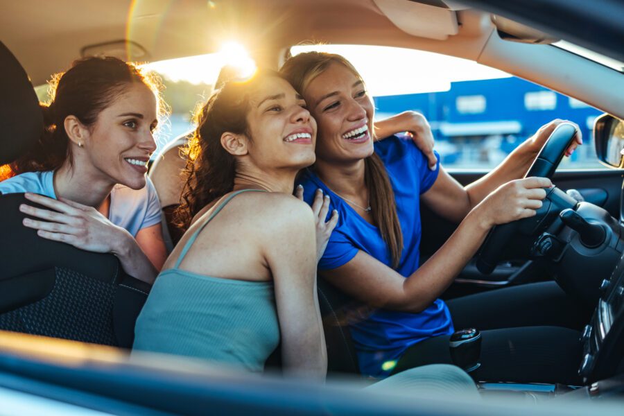 Girlfriends having fun on summer road trip