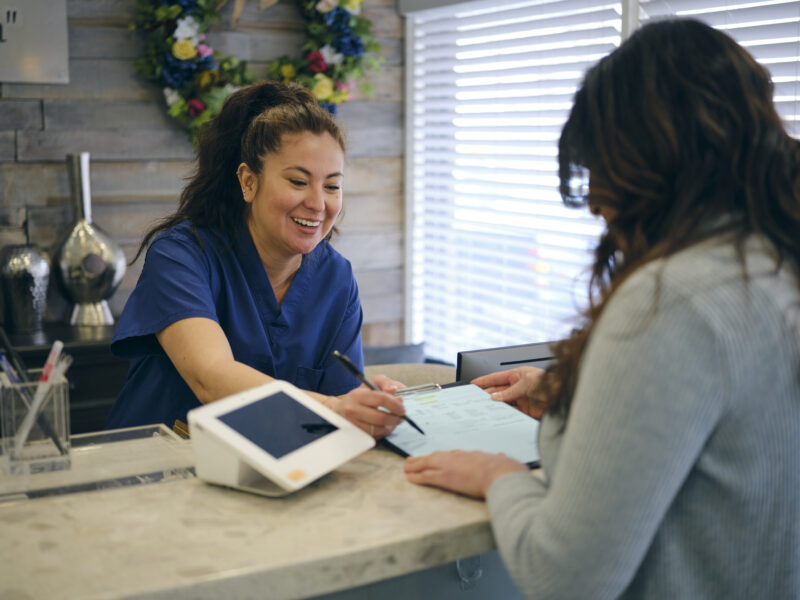 A front desk reception area at a medical clinic.