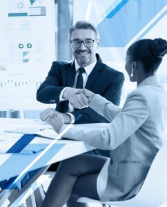 Corporate man and woman shaking hands