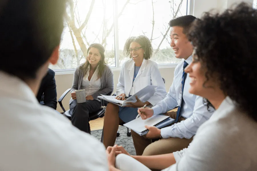 doctors-discussing-HMO-plans