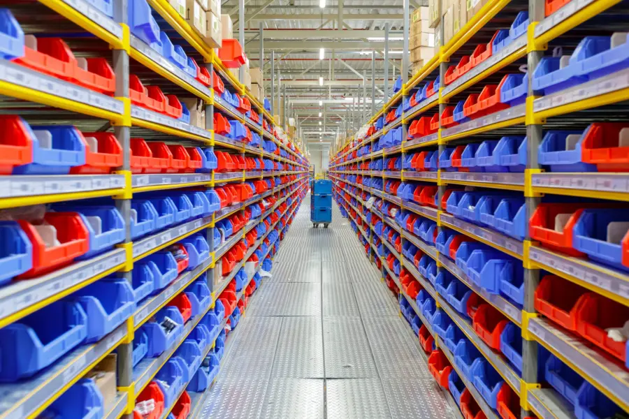 Massive warehouse with blue and red bins