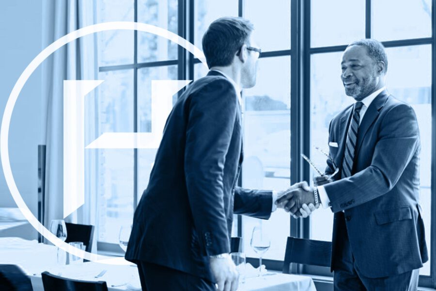 BusinessPartnersShakingHandsHiggFinancialHeader