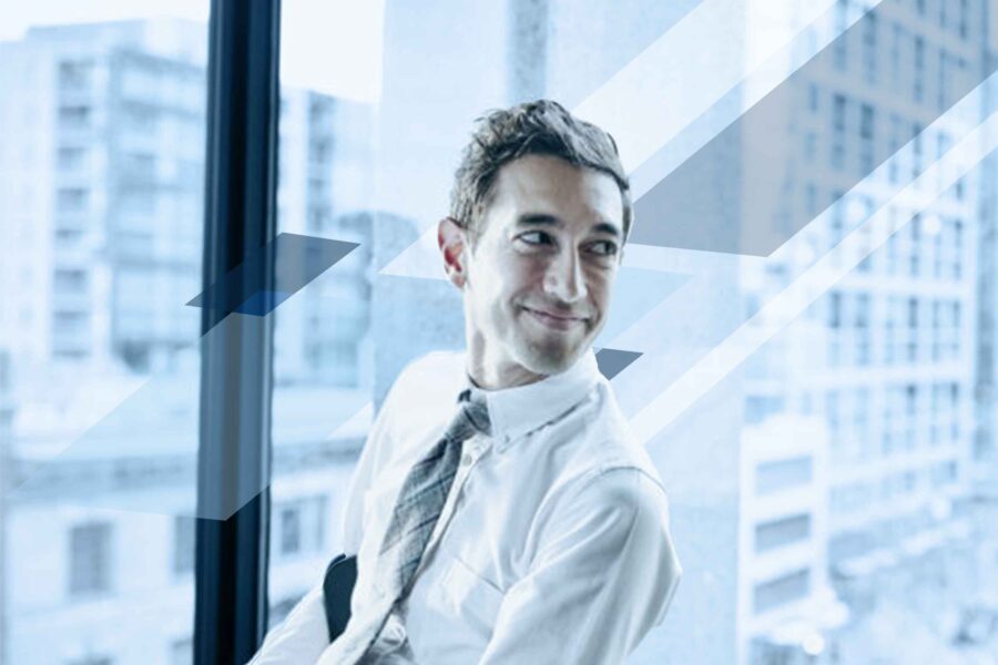 BusinessmanInFrontOfWindow