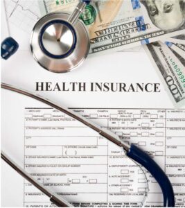 Image of health insurance form with money and stethoscope
