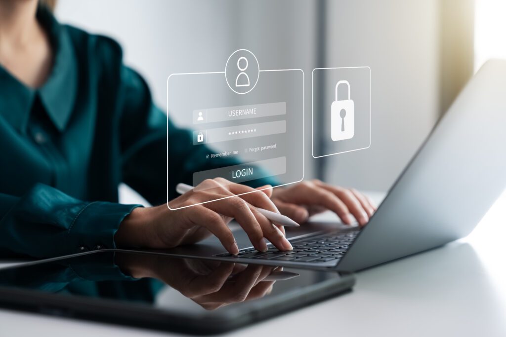 Businesswoman protecting her personal data on a laptop with a virtual interface