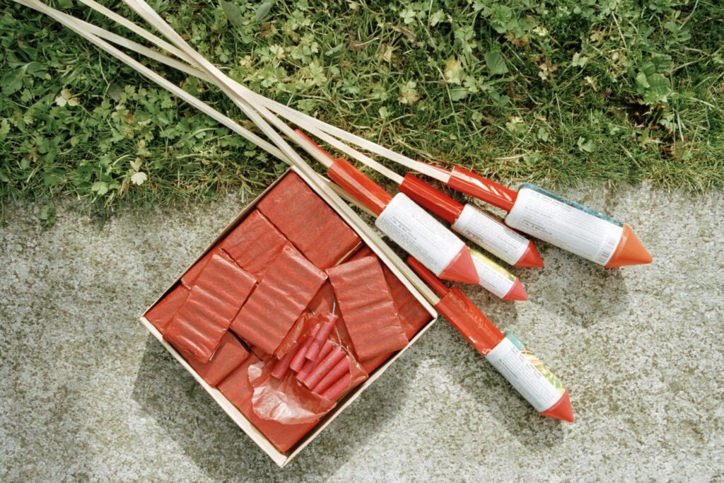 Bottle rockets and fireworks on ground
